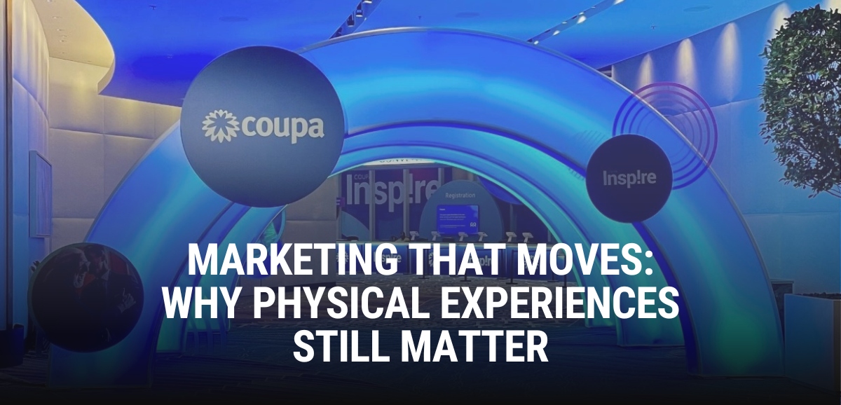 row of blue backlit arches with the text "marketing that moves" on top