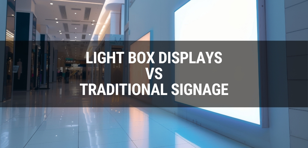 light box displays vs traditional signage text over a blank illuminated lightbox on a wall